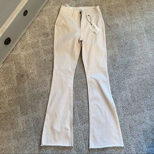 a loves a high rise slim fare cream jeans, size 27, never worn